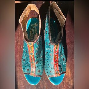 Marjan leather sandals from Spring Step floral cutouts.  •Collection: L'Artiste